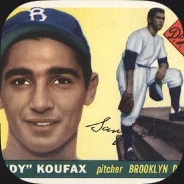 A 1955 baseball card of a pitcher in a blue cap